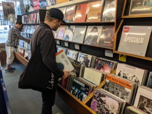 Tim looking at records